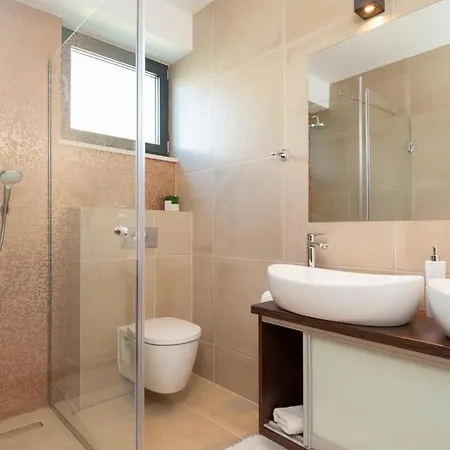 Luxury Beachfront Trogir: Oceanside Retreat With Pool & Gym Villa Trogir